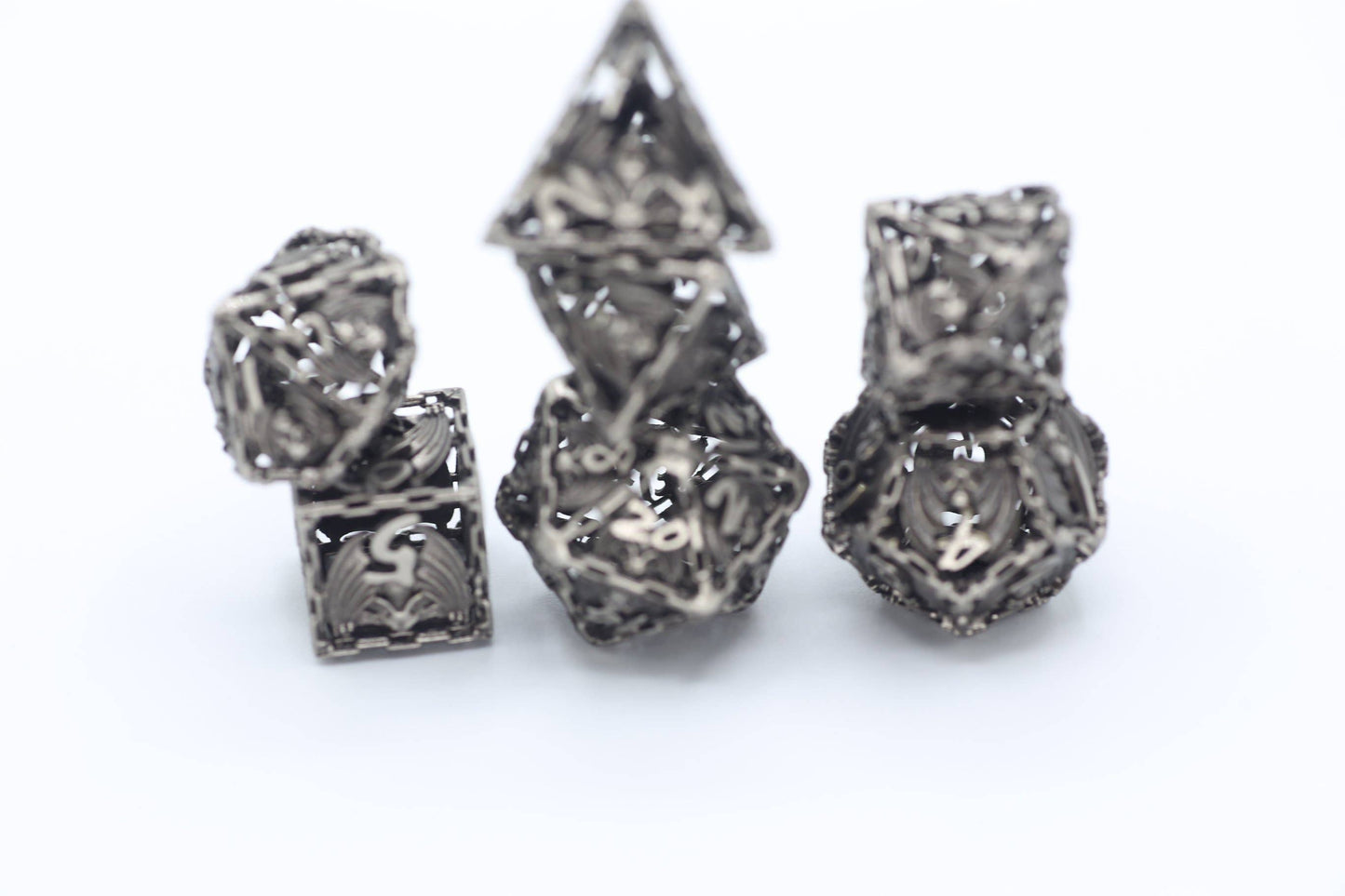 Ancient Silver Hollow Metal Bat Polyhedral Dice Set