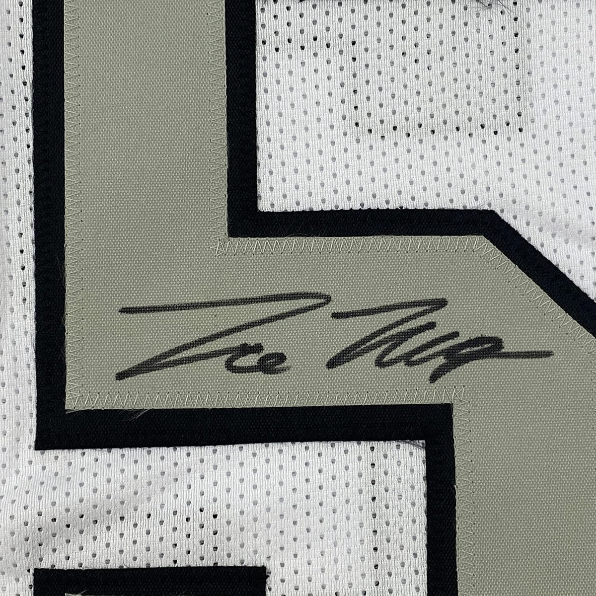 Framed Autographed/Signed Trevon Moehrig 35x39 Las Vegas Oakland White Color Rush Football Jersey JSA COA
