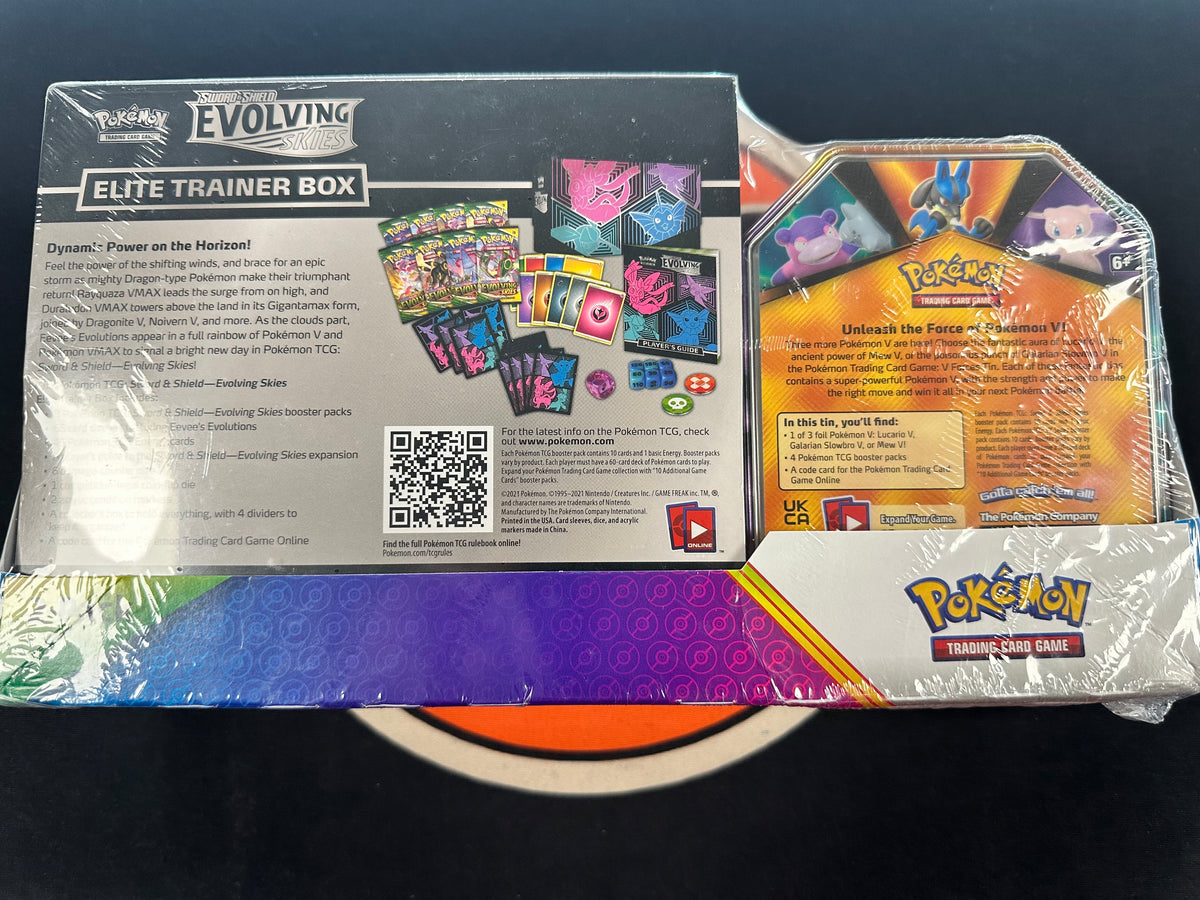 Evolving Skies Elite Trainer Box (Vaporeon) + Window Tin (Mew)