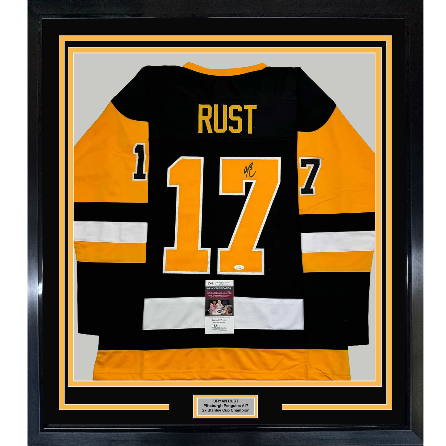 Framed Autographed/Signed Bryan Rust 35x39 Pittsburgh Black Hockey Jersey JSA COA