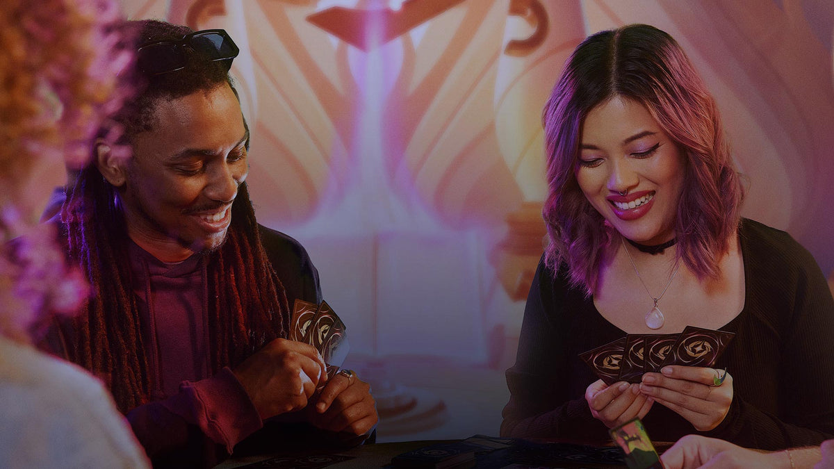 Players enjoying the Disney Lorcana Trading Card Game